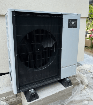 PAC unité extérieure installation résidentielle